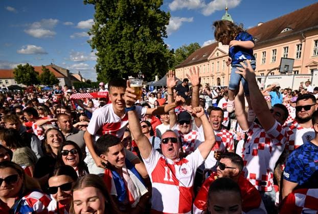 Croatia Squad UEFA EURO, EM, Europameisterschaft,Fussball 2024 Neuruppin Welcome party Croatia fans cheer during Croatia national team, Nationalteam UEFA EURO 2024 Welcome party at Neuruppin s school square in Neuruppin, Germany on June 9, 2024. The Croatian Football Federation has chosen the Neuruppin base camp for the Croatia national team during EURO 2024. MarkoxLukunic PIXSELL