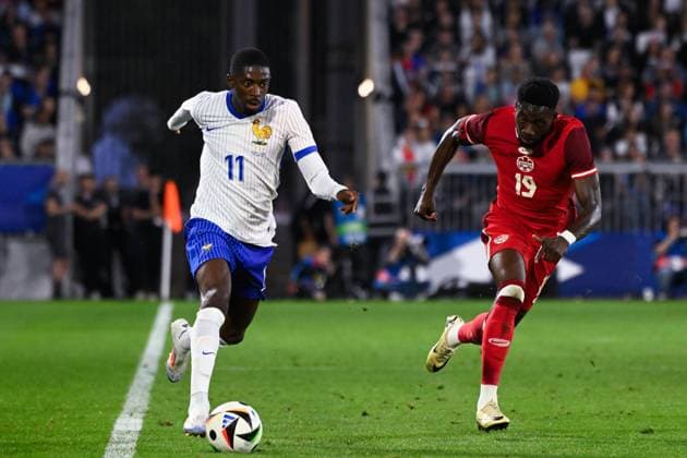 Ousmane Dembele ( 11 - France ) and Alphonso DAVIES ( 19 - Canada ) during the Friendly match between France and Canada at Matmut Atlantique on June 09, 2024 in Bordeaux, France. ( Photo by federico pestellini panoramic ) - FOOTBALL : France vs Canada - Bordeaux - 09 06 2024 FedericoPestellini Panoramic 