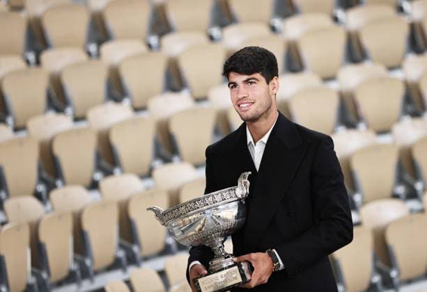 (240610) -- PARIS, June 10, 2024 -- Spain s Carlos Alcaraz poses with the trophy one day after winning the men s singles final of the French Open tennis tournament in Paris, France, June 10, 2024. ) (SP)FRANCE-PARIS-TENNIS-ROLAND GARROS-FRENCH OPEN-MEN S SINGLES-TROPHY GaoxJing 