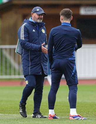 Scotland coach Coach Steve Clarke congratulates Billy Gilmour on his birthday during the training session Scotland Training Session and press conference, PK, Pressekonferenz UEFA European Championship, EM, Europameisterschaft 2024, Group A Football, Stadion am Groben, Garmisch-Partenkirchen, Germany, 11 Jun 2024 EDITORIAL USE ONLY No use with unauthorised audio, video, data, fixture lists, club league logos or live services. Online in-match use limited to 120 images, no video emulation. No use in betting, games or single club league player publications. Copyright: xPaulxCurrie Shutterstockx 14523736ay