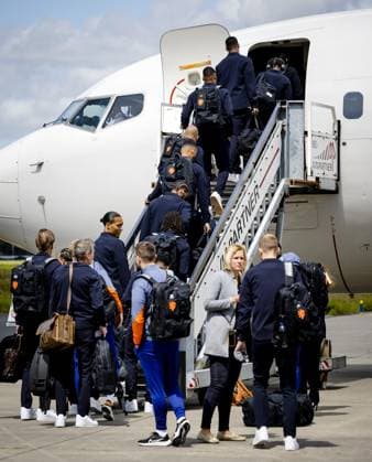 ROTTERDAM - The selection and staff of the Dutch national team, Nationalteam including Virgil van Dijk (3rd L), board the plane prior to departure to Germany. The selection goes to Wolfsburg for the training camp in the run-up to the European Football Championship. ANP SEM VAN DER WAL xVIxANPxSportx xxANPxIVx 500855386 originalFilename: 500855386.jpg