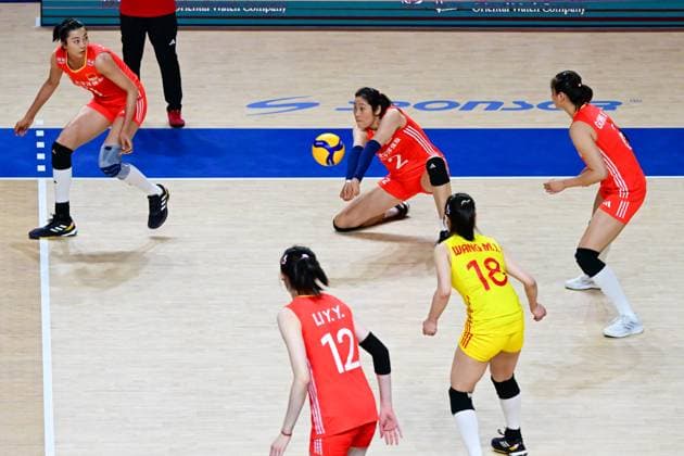 (240614) -- HONG KONG, June 14, 2024 -- Zhu Ting (top, C) of China passes the ball during the preliminary match between China and Germany at the Women s Volleyball Nations League 2024 Hong Kong in Hong Kong, south China, June 14, 2024. ) (SP)CHINA-HONG KONG-VOLLEYBALL-WOMEN S NATIONS LEAGUE 2024-CHINA VS GERMANY (CN) ZhuxWei 