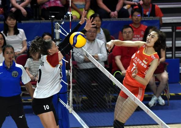 (240614) -- HONG KONG, June 14, 2024 -- Wang Yuanyuan (R) of China spikes the ball during the preliminary match between China and Germany at the Women s Volleyball Nations League 2024 Hong Kong in Hong Kong, south China, June 14, 2024. ) (SP)CHINA-HONG KONG-VOLLEYBALL-WOMEN S NATIONS LEAGUE 2024-CHINA VS GERMANY (CN) LoxPingxFai 