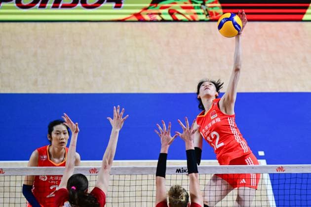 (240614) -- HONG KONG, June 14, 2024 -- Li Yingying (R) of China spikes the ball during the preliminary match between China and Germany at the Women s Volleyball Nations League 2024 Hong Kong in Hong Kong, south China, June 14, 2024. ) (SP)CHINA-HONG KONG-VOLLEYBALL-WOMEN S NATIONS LEAGUE 2024-CHINA VS GERMANY (CN) ZhuxWei 