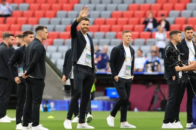 14th June 2024; Munich Football Arena, Munich, Germany; Euro 2024 Group A Football, Germany versus Scotland; Scottish players arrive on the pitch with Angus Gunn (SCO) the Goalkeeper saying hello to fans  ActionPlus12654220 PierrexTeyssot