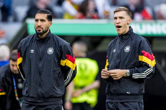 UEFA EURO 2024: Eröffnungsspiel Deutschland - Schottland; 14.06.2024 Emre Can (Deutschland, 25), Nico Schlotterbeck (Deutschland, 15) bei der Platzbegehung. UEFA EURO 2024: Eröffnungsspiel Deutschland - Schottland; Munich Football Arena, München am 14.06.2024 Copyright: xBEAUTIFULxSPORTS Wunderlx