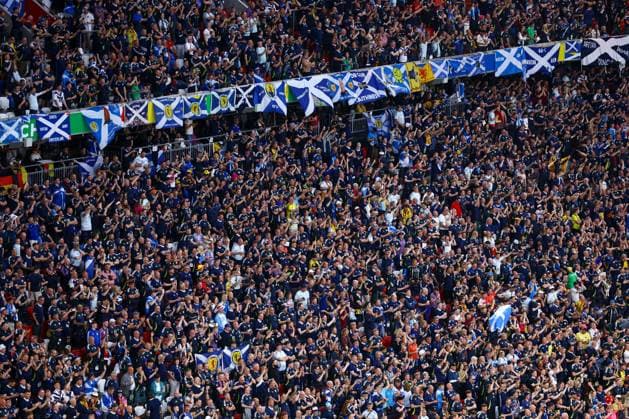 Scotland fans enjoy the pre-match atmosphere Germany v Scotland, UEFA European Championship, EM, Europameisterschaft 2024, Group A, Football, Munich Football Arena, Munich, Germany, 14 Jun 2024 EDITORIAL USE ONLY No use with unauthorised audio, video, data, fixture lists, club league logos or live services. Online in-match use limited to 120 images, no video emulation. No use in betting, games or single club league player publications. Copyright: xKieranxMcManus Shutterstockx 14523770ah
