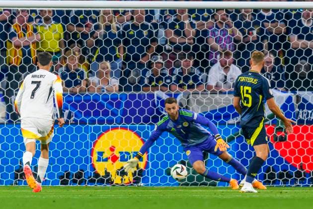 GER, UEFA Euro 2024, Gruppe A, Deutschland (GER) vs Schottland (SCO) 14.06.2024, Allianz Arena, Muenchen, GER, UEFA Euro 2024, Gruppe A, Deutschland (GER) vs Schottland (SCO) , im Bild Tor zum 1-0 durch Florian Wirtz (Germany 17) nicht im Bild mit Angus Gunn (Scottland 1) Kai Havertz (Germany 7) Ryan Porteous (Scottland 15)