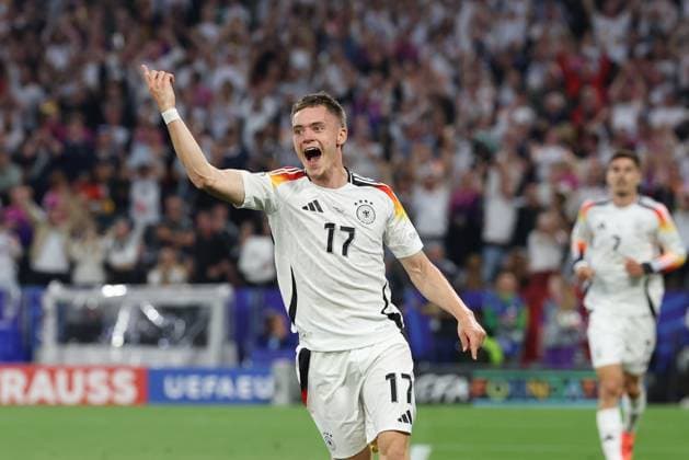 Torjubel von Florian Wirtz 17 (Deutschland) zum 1:0, Deutschland vs. Schottland, Fussball, UEFA EURO, EM, Europameisterschaft,Fussball 2024, Gruppenphase, 1. Spieltag, 14.06.2024 DFB regulations prohibit any use of photographs as image sequences and or quasi-video Muenchen Bayern Deutschland
