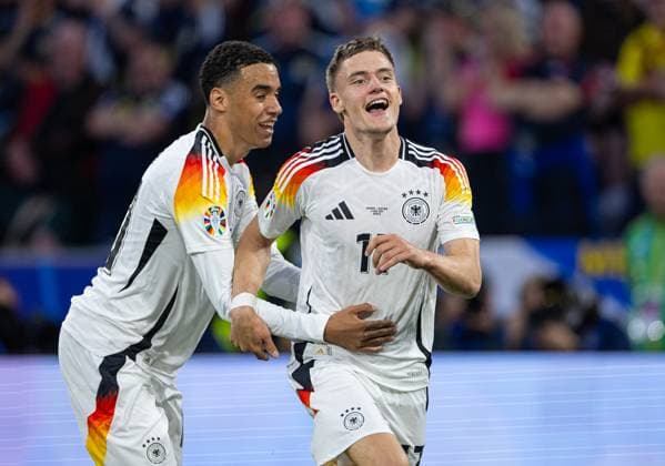 Football - UEFA EURO, EM, Europameisterschaft,Fussball 2024 - Group A - Germany v Scotland MUNICH, GERMANY - Friday, June 14, 2024: Germany s Florian Wirtz celebrates after scoring the first goal during the opening UEFA Euro 2024 match between Germany and Scotland at the Allianz Arena. (Photo by David Rawcliffe Propaganda) MUNICH Allianz Arena BAVARIA GERMANY  Copyright: xDavidxRawcliffex P2024-06-14-Germany_Scotland-72