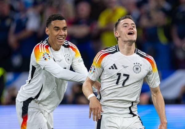 Football - UEFA EURO, EM, Europameisterschaft,Fussball 2024 - Group A - Germany v Scotland MUNICH, GERMANY - Friday, June 14, 2024: Germany s Florian Wirtz celebrates after scoring the first goal during the opening UEFA Euro 2024 match between Germany and Scotland at the Allianz Arena. (Photo by David Rawcliffe Propaganda) MUNICH Allianz Arena BAVARIA GERMANY  Copyright: xDavidxRawcliffex P2024-06-14-Germany_Scotland-73