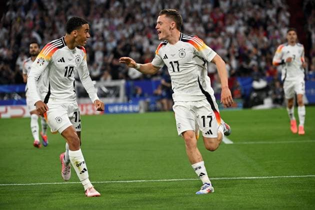 Muenchen, Munich Football Arena, 14.06.24, GER, Herren, UEFA EURO, EM, Europameisterschaft,Fussball 2024, Deutschland - Schottland Bild: Florian WIRTZ (Deutschland) jubelt nach seinem Tor zum 1:ß mit Jamal MUSIALA (Deutschland) Only for editorial use! UEFA regulations prohibit any use of photographs as image sequences and or quasi-video. Bayern Deutschland