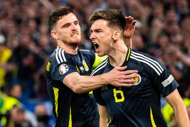 240614 Andrew Robertson and Kieran Tierney of Scotland during the UEFA EURO, EM, Europameisterschaft,Fussball 2024 Football Championship match between Germany and Scotland on June 14, 2024 in Munich. Photo: Mathias Bergeld BILDBYRAN kod MB MB0933 fotboll football soccer fotball fotbolls-em europamästerskap em uefa euro uefa european football championship euro 2024 tyskland germany scotland bbeng skottland Copyright: MATHIASxBERGELD BB240614MB056