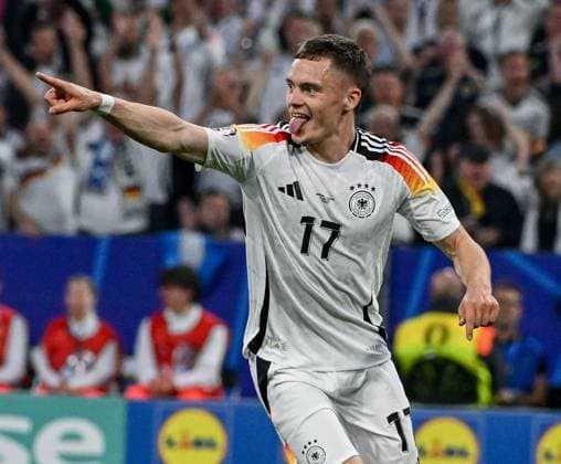 14.06.2024, xpsx, UEFA EURO, EM, Europameisterschaft,Fussball 2024 Vorrunde, Deutschland - Schottland v.l. celebrate the goal, Torjubel zum 1:0 Torschütze Florian Wirtz (Deutsche Fussball Nationalmannschaft DFB) (DFL DFB REGULATIONS PROHIBIT ANY USE OF PHOTOGRAPHS as IMAGE SEQUENCES and or QUASI-VIDEO) München Bayern Deutschland (DEU)