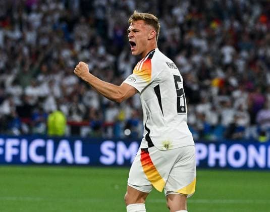 14.06.2024, xpsx, UEFA EURO, EM, Europameisterschaft,Fussball 2024 Vorrunde, Deutschland - Schottland v.l. celebrate the goal, Torjubel zum 1:0 Torschütze Florian Wirtz (Deutsche Fussball Nationalmannschaft DFB), Joshua Kimmich (Deutsche Fussball Nationalmannschaft DFB) (DFL DFB REGULATIONS PROHIBIT ANY USE OF PHOTOGRAPHS as IMAGE SEQUENCES and or QUASI-VIDEO) München Bayern Deutschland (DEU)