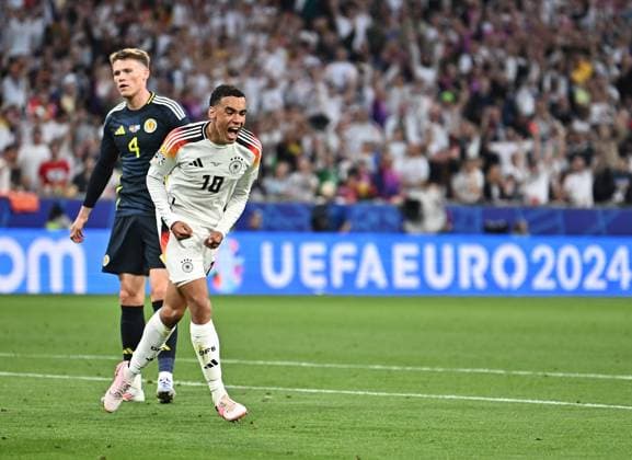 14.06.2024, xscotx, Fussball EM 2024, Deutschland - Schottland, emspor, v.l. Jamal Musiala (Deutsche Fussball Nationalmannschaft DFB) celebrate the goal, Der Torjubel zum 2:0 München