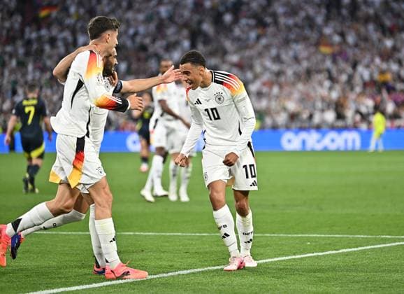 14.06.2024, xscotx, Fussball EM 2024, Deutschland - Schottland, emspor, v.l. Jamal Musiala (Deutsche Fussball Nationalmannschaft DFB) celebrate the goal, Der Torjubel zum 2:0 München