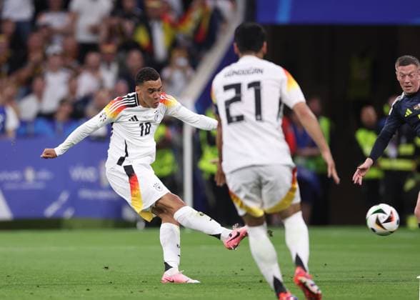 Munich, Germany, 14th June 2024. Jamal Musiala of Germany scoring their second goal during the UEFA European Championships match at Allianz Arena, Munich. Picture credit should read: David Klein Sportimage EDITORIAL USE ONLY. No use with unauthorised audio, video, data, fixture lists, club league logos or live services. Online in-match use limited to 120 images, no video emulation. No use in betting, games or single club league player publications. SPI-3194-0070