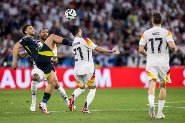 UEFA EURO 2024: Eröffnungsspiel Deutschland - Schottland; 14.06.2024 Che Adams (Schottland, 10), Ilkay Gündogan (Deutschland, 21), Jonathan Tah (Deutschland, 4). UEFA EURO 2024: Eröffnungsspiel Deutschland - Schottland; Munich Football Arena, München am 14.06.2024 Copyright: xBEAUTIFULxSPORTS Wunderlx