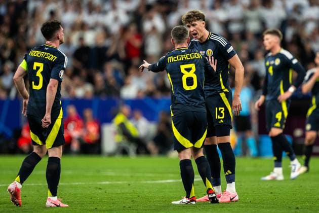 240614 Callum McGregor and Jack Hendry of Scotland during the UEFA EURO, EM, Europameisterschaft,Fussball 2024 Football Championship match between Germany and Scotland on June 14, 2024 in Munich. Photo: Mathias Bergeld BILDBYRAN kod MB MB0933 fotboll football soccer fotball fotbolls-em europamästerskap em uefa euro uefa european football championship euro 2024 tyskland germany scotland bbeng skottland Copyright: MATHIASxBERGELD BB240614MB078