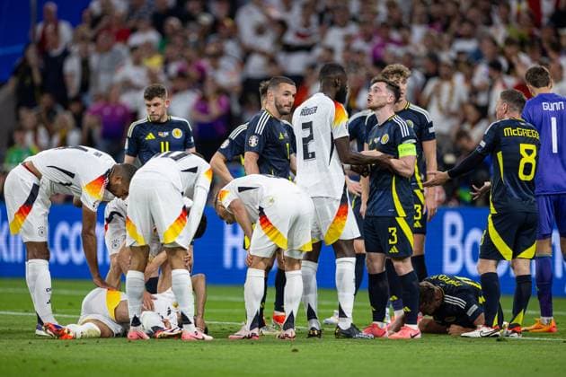 Football - UEFA EURO, EM, Europameisterschaft,Fussball 2024 - Group A - Germany v Scotland MUNICH, GERMANY - Friday, June 14, 2024: Scotland s captain Andy Robertson clashes with Germany s Antonio Rüdiger (L) during the opening UEFA Euro steps in 2024 match between Germany and Scotland at the Allianz Arena. (Photo by David Rawcliffe Propaganda) MUNICH Allianz Arena BAVARIA GERMANY  Copyright: xDavidxRawcliffex P2024-06-14-Germany_Scotland-94
