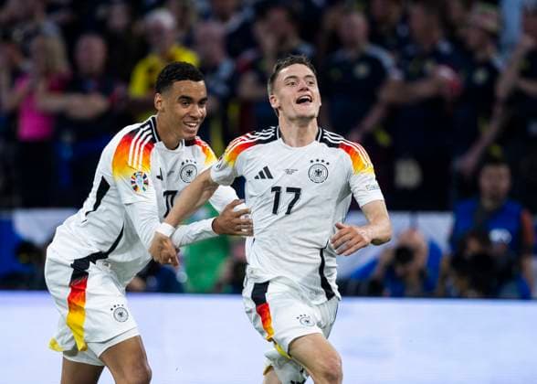 Muenchen, Allianz Arena, 19.09.2021: Florian Wirtz of germany celebrates scoring the 1:0 goal with Jamal Musiala of germany during the match UEFA European Championship, EM, Europameisterschaft 2024 Germany v. Scotland.