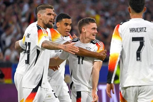 Torjubel Florian Wirtz (GER) mit Jamal MUSIALA (GER) nach Tor um 1-0,li:Robert Andrich (GER), Jubel,Freude,Begeisterung,Aktion. Gruppenphase Gruppe A Deutschland (GER) - Schottland (SCO) am 14.06.2024 Fussball Arena Muenchen, Fussball UEFA EURO, EM, Europameisterschaft,Fussball 2024 GERMANY vom 14.06.2024 - 14.07.2024.