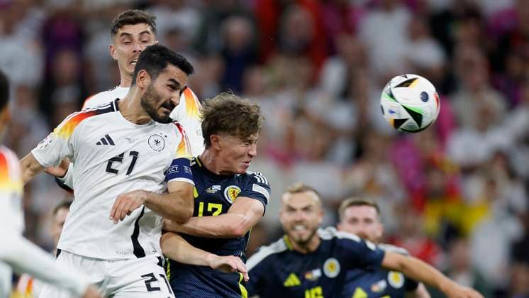 14.06.2024, Fussball, Europameisterschaft, Germany - Scotland, GER, Munich, Munich Football Arena, Bild: v. li. Ä°lkay Guendogan (Germany, 21) und Jack Hendry (Scotland, 13). Copyright: HMBxMedia xHeikoxBecker