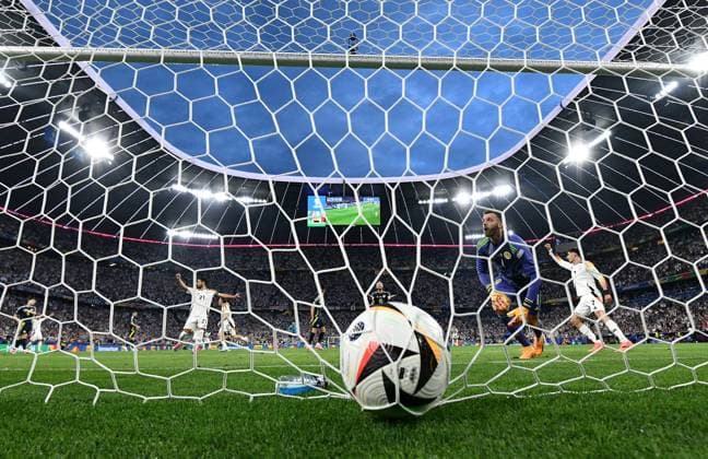 14.06.2024, xscotx, Fussball EM 2024, Deutschland - Schottland, emspor, v.l. Florian Wirtz (Deutsche Fussball Nationalmannschaft DFB), Angus Gunn (Team Schottland) Goal scored, erziehlt das Tor zum 1:0 München