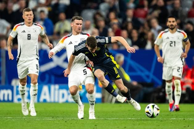 240614 Pascal Gross of Germany and Ryan Christie of Scotland during the UEFA EURO, EM, Europameisterschaft,Fussball 2024 Football Championship match between Germany and Scotland on June 14, 2024 in Munich. Photo: Mathias Bergeld BILDBYRAN kod MB MB0933 fotboll football soccer fotball fotbolls-em europamästerskap em uefa euro uefa european football championship euro 2024 tyskland germany scotland bbeng skottland bbauto Copyright: MATHIASxBERGELD BB240614MB102