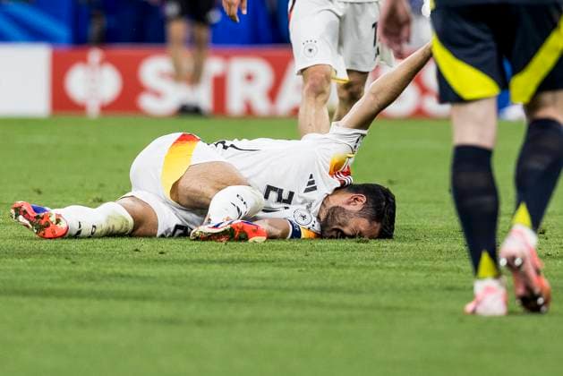 UEFA EURO 2024: Eröffnungsspiel Deutschland - Schottland; 14.06.2024 Ilkay Gündogan (Deutschland, 21) am Boden. UEFA EURO 2024: Eröffnungsspiel Deutschland - Schottland; Munich Football Arena, München am 14.06.2024 Copyright: xBEAUTIFULxSPORTS Wunderlx