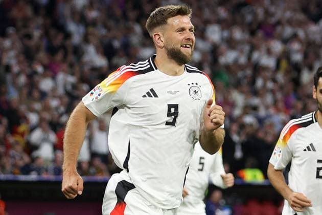 Niclas Füllkrug of Germany celebrates scoring the goal for their side with their teammates to make it 4-0 Germany v Scotland, UEFA European Championship, EM, Europameisterschaft 2024, Group A, Football, Munich Football Arena, Munich, Germany, 14 Jun 2024 EDITORIAL USE ONLY No use with unauthorised audio, video, data, fixture lists, club league logos or live services. Online in-match use limited to 120 images, no video emulation. No use in betting, games or single club league player publications.  Copyright: xPaulxCurrie Shutterstockx 14523776fi