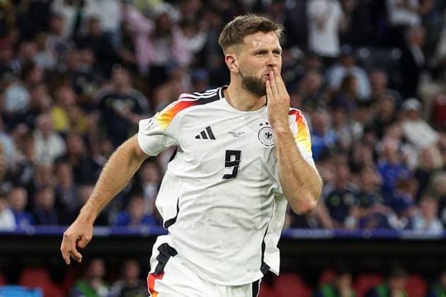 Niclas Füllkrug of Germany celebrates scoring the goal for their side with their teammates to make it 4-0 Germany v Scotland, UEFA European Championship, EM, Europameisterschaft 2024, Group A, Football, Munich Football Arena, Munich, Germany, 14 Jun 2024 EDITORIAL USE ONLY No use with unauthorised audio, video, data, fixture lists, club league logos or live services. Online in-match use limited to 120 images, no video emulation. No use in betting, games or single club league player publications.  Copyright: xPaulxCurrie Shutterstockx 14523776fj