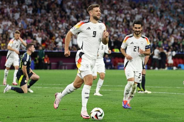 Niclas Füllkrug of Germany celebrates scoring the goal for their side with their teammates to make it 4-0 Germany v Scotland, UEFA European Championship, EM, Europameisterschaft 2024, Group A, Football, Munich Football Arena, Munich, Germany, 14 Jun 2024 EDITORIAL USE ONLY No use with unauthorised audio, video, data, fixture lists, club league logos or live services. Online in-match use limited to 120 images, no video emulation. No use in betting, games or single club league player publications.  Copyright: xPaulxCurrie Shutterstockx 14523776fk