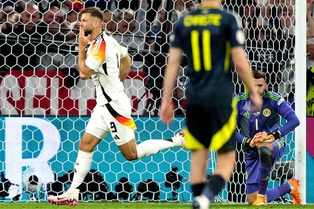 Germany s Niclas Fuellkrug celebrates after scoring 4-0 during the Euro 2024 soccer match between Germany and Scotland at the Allianz Arena , Munich, Germany - Friday 14 , June , 2024. - Soccer .  Copyright: xSpada LaPressex