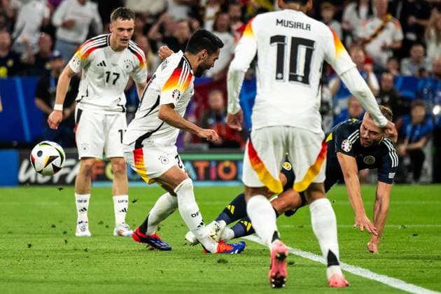 240614 Ilkay Gündogan of Germany and Ryan Porteous of Scotland during the UEFA EURO, EM, Europameisterschaft,Fussball 2024 Football Championship match between Germany and Scotland on June 14, 2024 in Munich. Photo: Mathias Bergeld BILDBYRAN kod MB MB0933 fotboll football soccer fotball fotbolls-em europamästerskap em uefa euro uefa european football championship euro 2024 tyskland germany scotland bbeng skottland bbauto Copyright: MATHIASxBERGELD BB240614MB128