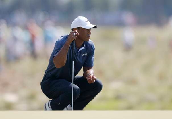 Tiger Woods lines up a putt on the twelfth green during the second round of the 124th U.S. Open golf championship at Pinehurst Resort & Country Club in Pinehurst, N.C. on Friday, June 14, 2024.  NCP20240614777 JOHNxANGELILLO