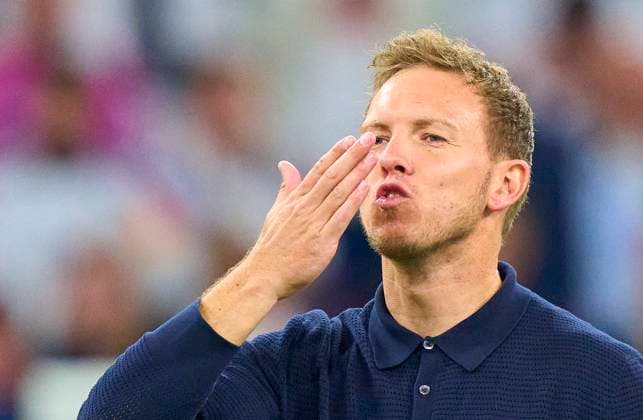 DFB headcoach Julian Nagelsmann , Bundestrainer, Nationaltrainer, celebrate, kiss Lena Wurzenberger, girlfriend of Julian Nagelsmann, coach DFB, after the group stage match GERMANY - SCOTLAND 5-1 of the UEFA European Championships 2024 on Jun 14, 2024 in Munich, Germany.
