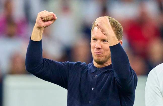 DFB headcoach Julian Nagelsmann , Bundestrainer, Nationaltrainer, celebrate, kiss Lena Wurzenberger, girlfriend of Julian Nagelsmann, coach DFB, after the group stage match GERMANY - SCOTLAND 5-1 of the UEFA European Championships 2024 on Jun 14, 2024 in Munich, Germany.