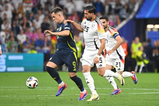 Emre CAN (GER), Aktion,Zweikampf gegen Lawrence SHANKLAND (Schottland). Gruppenphase Gruppe A Deutschland (GER) - Schottland (SCO) 5-1 am 14.06.2024 Fussball Arena Muenchen, Fussball UEFA EURO, EM, Europameisterschaft,Fussball 2024 GERMANY vom 14.06.2024 - 14.07.2024.