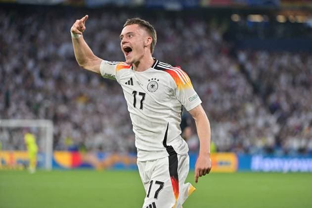 Bild zeigt: Torjubel Deutschland, Florian Wirtz (17, Deutschland), 14.06.2024, München, Fussball, Europameisterschaft, Deutschland - Schottland, EVENT REGULATIONS PROHIBIT ANY USE OF PHOTOGRAPHS AS IMAGE SEQUENCES AND OR QUASI-VIDEO.