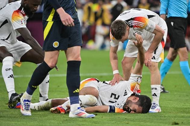 Bild zeigt: Verletzung bei Ilkay Gündogan (21, Deutschland), 14.06.2024, München, Fussball, Europameisterschaft, Deutschland - Schottland, EVENT REGULATIONS PROHIBIT ANY USE OF PHOTOGRAPHS AS IMAGE SEQUENCES AND OR QUASI-VIDEO.