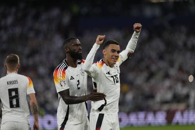 EURO 2024 - Matchday 1: Germany vs. Scotland Jamal Musiala scores and celebrates with Antonio Rudiger during the EURO 2024 Day 1 opening match between Germany and Scotland on 14 June 2024, at Munich Football Arena, in Munich, Germany Munich Munich Football Arena Germany Copyright: xAlexandraxFechetex _ADR3882