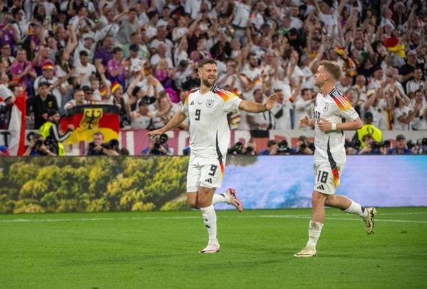 Fussball, Herren, Saison 2023 24, Euro 20204 Gruppe A (1. Spieltag) in München, Deutschland - Schottland (5:1), Niclas Füllkrug (Deutschland), Maximilian Mittelstädt (Deutschland), Jubel nach Tor zum 4:0, 14.06. 2024, Copyright: xMatthiasxKochx