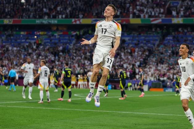 Torjubel von Florian Wirtz 17 (Deutschland) zum 1:0, Deutschland vs. Schottland, Fussball, UEFA EURO, EM, Europameisterschaft,Fussball 2024, Gruppenphase, 1. Spieltag, 14.06.2024 DFB regulations prohibit any use of photographs as image sequences and or quasi-video Muenchen Bayern Deutschland