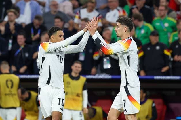 Torjubel von von Jamal Musiala 10 (Deutschland), Kai Havertz 7 (Deutschland) zum 3:0, Deutschland vs. Schottland, Fussball, UEFA EURO, EM, Europameisterschaft,Fussball 2024, Gruppenphase, 1. Spieltag, 14.06.2024 DFB regulations prohibit any use of photographs as image sequences and or quasi-video Muenchen Bayern Deutschland