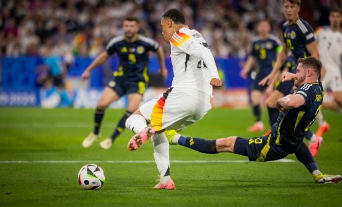 Munich, Germany. 14th Jun 2024. Jamal Musiala (DFB) Tony Ralston (Sco) Germany - Scotland Deutschland - Schottland 14.06.2024