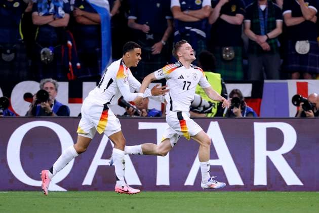 WIRTZ Florian Team Deutschland jubelt nach seinem Tor zum 1 : 0 mit MUSIALA Jamal UEFA Fussball Eueropameisterschaften 2024 in Deutschland Eroeffnungsspiel Deutschland - Schottland am 14.06. 2024in München DFL REGULATIONS PROHIBIT ANY USE OF PHOTOGRAPHS as IMAGE SEQUENCES and or QUASI-VIDEO Copyright: xLacixPerenyix