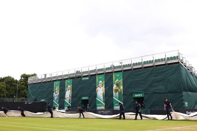 15th June 2024; Lexus Nottingham Tennis Centre, Nottingham, England; Rothesay Nottingham Open, Day 6; Rain covers are pulled over the court by grounds staff  ActionPlus12654627 ShaunxBrooks