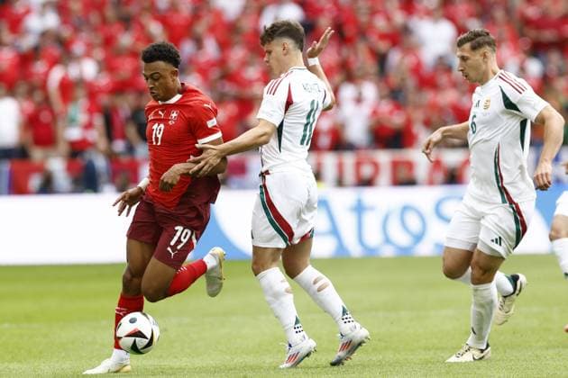 COLOGNE, RheinEnergie Stadium, 15-06-2024 , European Football Championship Euro2024, Group stage match no.2 between Hungary and Switzerland. Hungary player Milos Kerkez and Switzerland player Dan Ndoye Hungary - Switzerland (Euro2024)  x25494558x Copyright:
